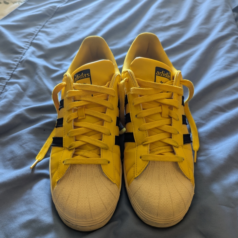 Adidas Yellow Sneakers with Black Stripes